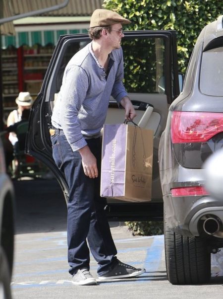 Jason Segel spotted picking up some stuff in his Audi Q7.